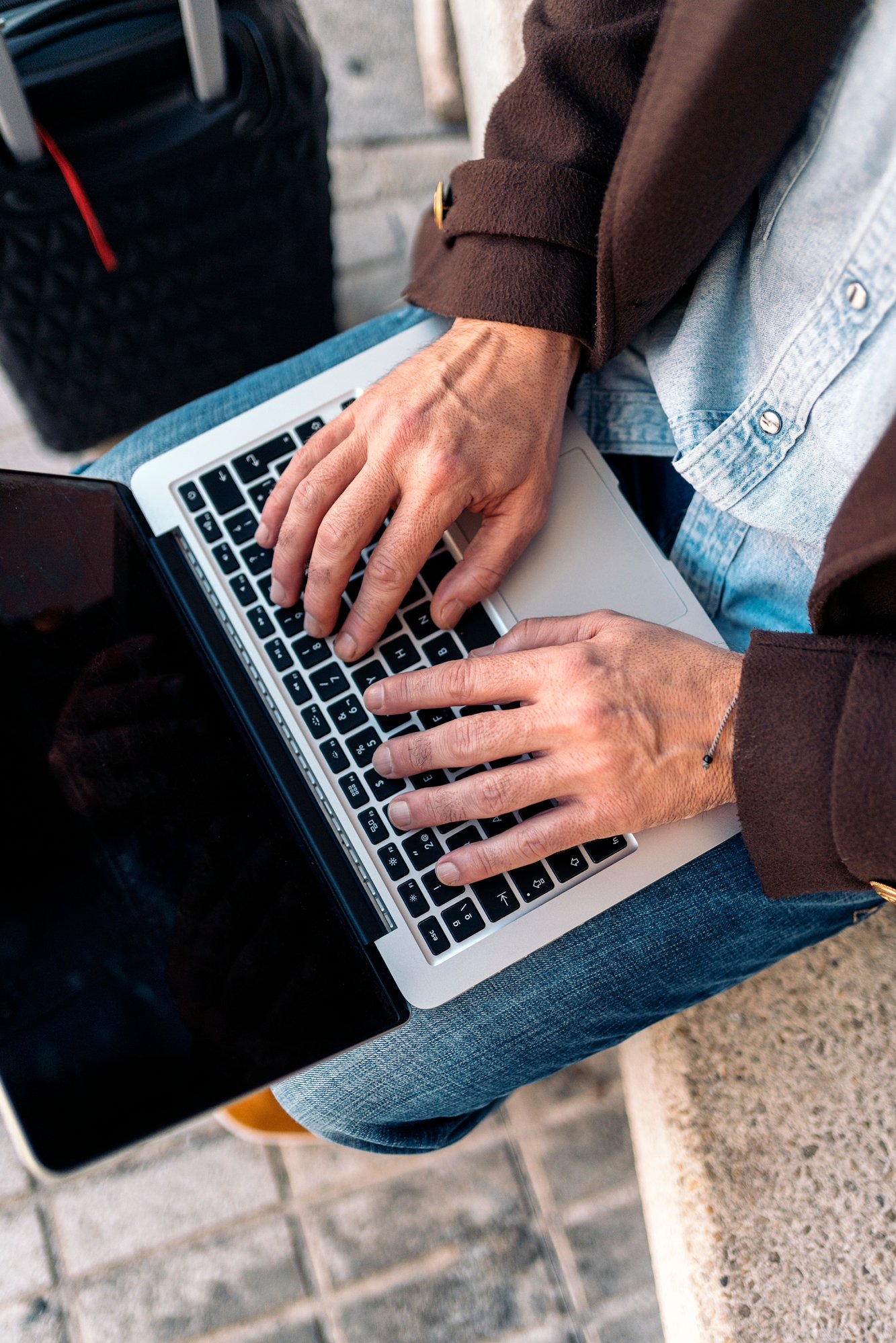 close-up-of-an-unrecognizable-business-man-using-l-2024-10-18-07-12-48-utc-1