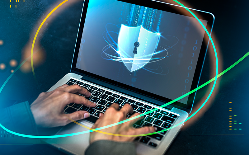 hands-typing-on-a-laptop-with-security-shield-2026-01-07-23-24-09-utc